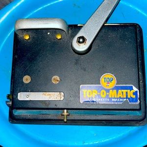 Tap O-Matic cigarette machine